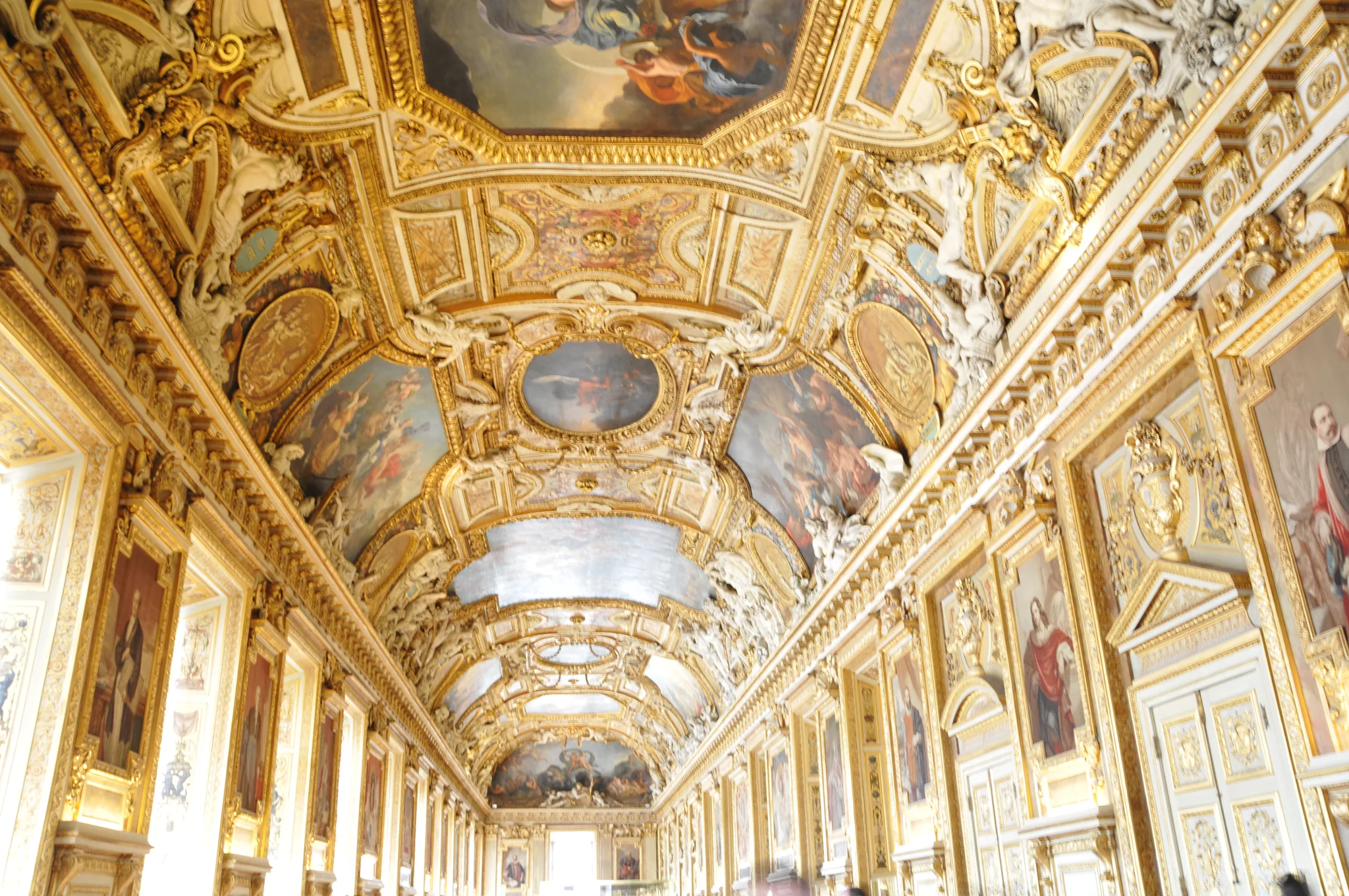 The Louvre palace and glass pyramid in Paris
